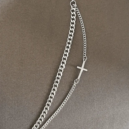 Pulsera con cruz de acero de titanio